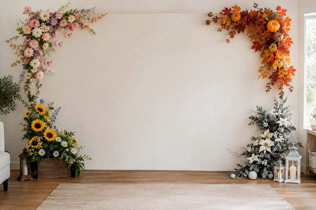 Neutral party photo backdrop with spring, summer, autumn, and winter accents along the edges