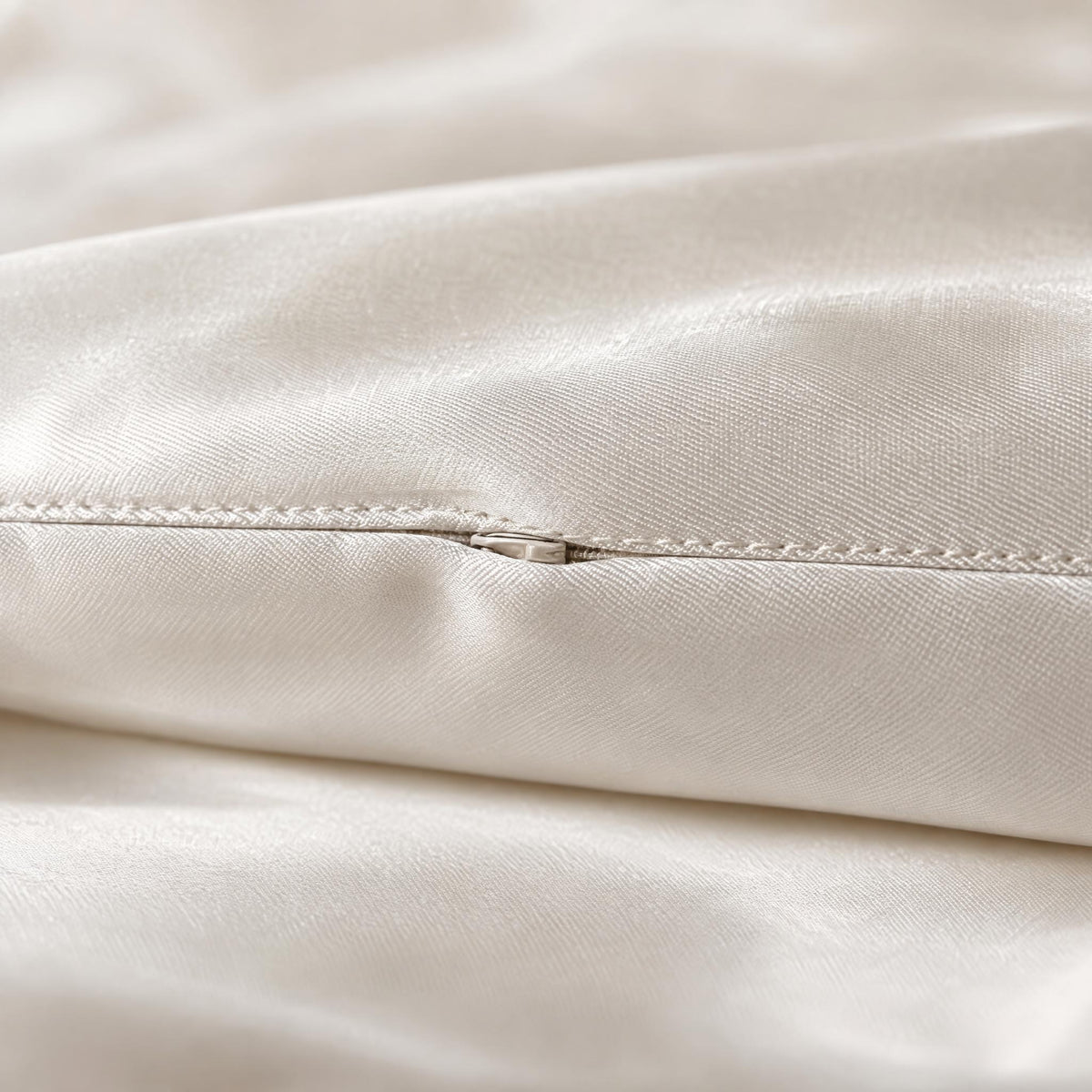 Close-up of the concealed hidden zipper on a mulberry silk pillowcase