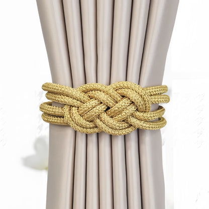 Tieback holding beige curtains