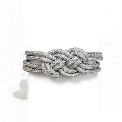 Magnetic curtain tieback on pure white background