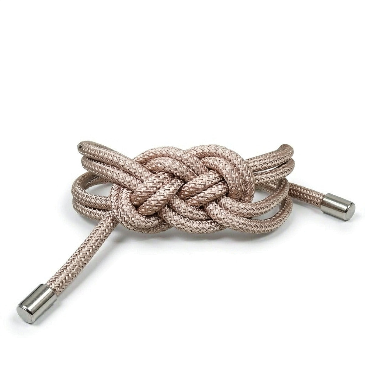 Magnetic curtain tieback on pure white background