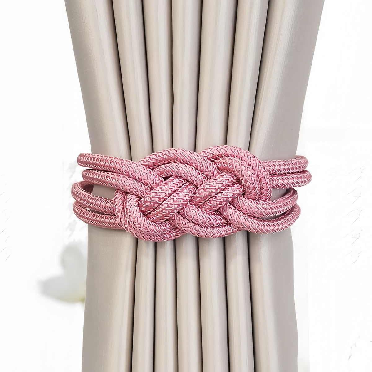 Tieback holding beige curtains