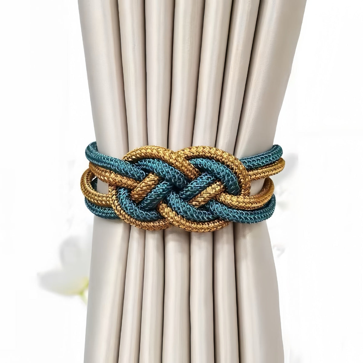 Tieback holding beige curtains